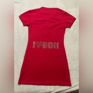 Girls golf women’s size medium fitted polo dress. Rhinestone detail on back.